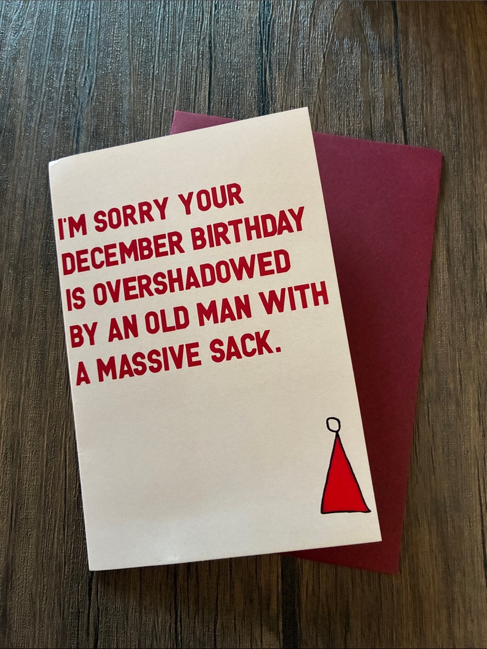 Humorous December Birthday Card with Red Burgundy Envelope